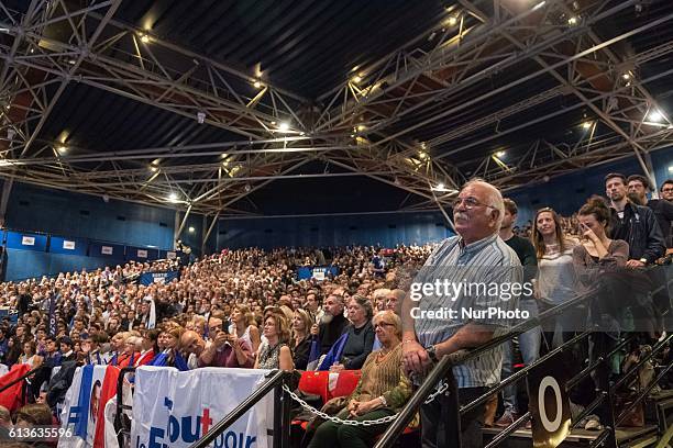 Supporters of Nicolas Sarkozy, former French president who is running again in the next election, as seen during a campaign rally at Le Zenith in...