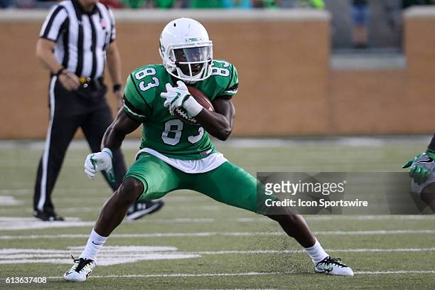 North Texas Mean Green wide receiver Tyler Wilson catches a pass during the first half against the Marshall Thundering Herd at Apogee Stadium in...