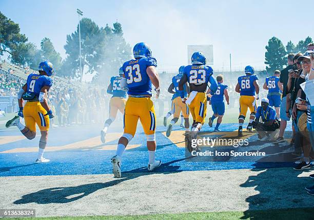 San Jose State Spartans players run onto the field prior to the Mountain West Conference game between San Jose State Spartans verses the Hawaii...