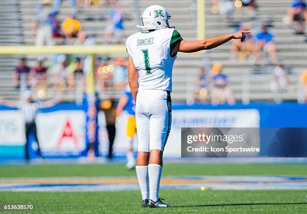 Hawaii Warriors place kicker Rigoberto Sanchez signals that he is ready to kick off the ball during the Mountain West Conference game between San...