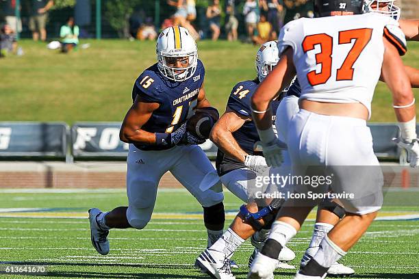 Chattanooga Mocs quarterback Alejandro Bennifield \looks to run the ball during the first half of the NCAA football game between UT Chattanooga and...