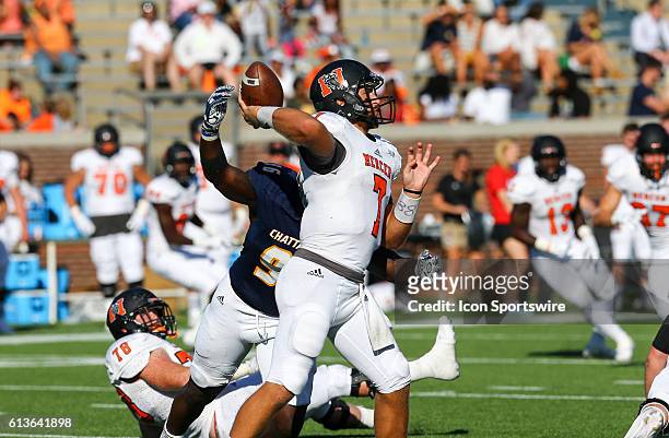 Mercer Bears quarterback John Russ drops back to pass during the second half of the NCAA football game between UT Chattanooga and Mercer University....