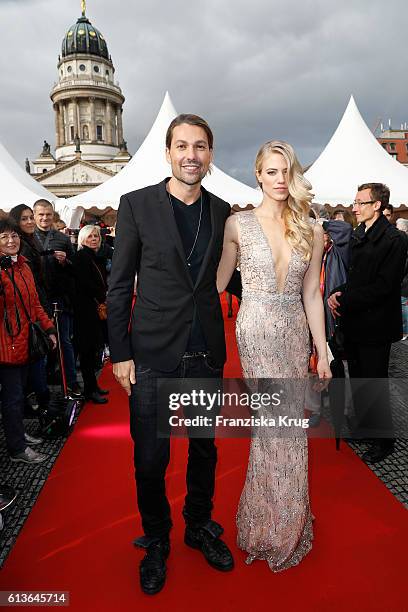 David Garrett and Larissa Marolt attend the ECHO Klassik 2016 at Konzerthaus Am Gendarmenmarkt on October 09, 2016 in Berlin, Germany.