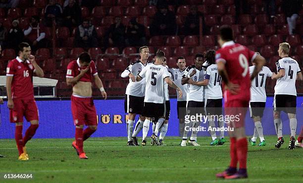Players of Austria celebrate their during the FIFA 2018 World Cup Qualifier between Serbia and Austria at Rajko Mitic Stadium on October 9, 2016 in...