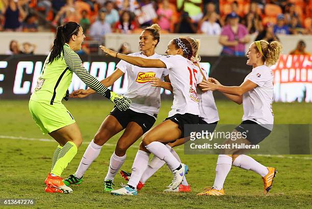 Goalkeeper Sabrina D'Angelo of the Western New York Flash celebrates with her teammates after defeating the Washington Spirit in a shootout during...