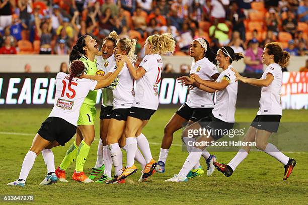 Goalkeeper Sabrina D'Angelo of the Western New York Flash celebrates with her teammates after defeating the Washington Spirit in a shootout during...