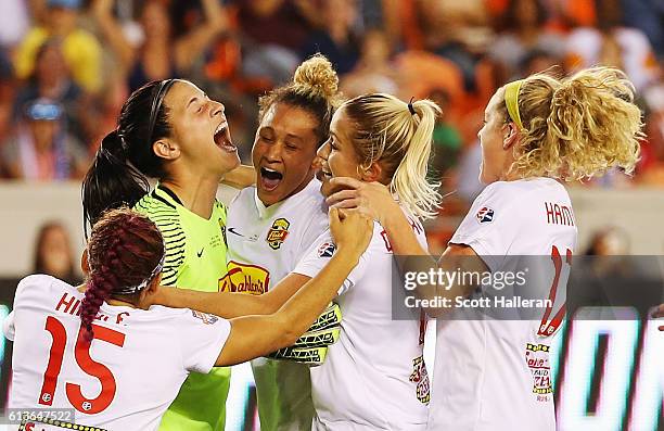 Goalkeeper Sabrina D'Angelo of the Western New York Flash celebrates with her teammates after defeating the Washington Spirit in a shootout during...