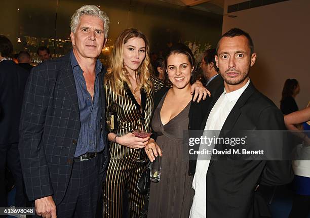 Tim Boyd, Daisy Boyd, Rebecca Macmillan and Dan Macmillan attend Dan Macmillan & Daisy Boyd's engagement party at River Cafe on October 9, 2016 in...