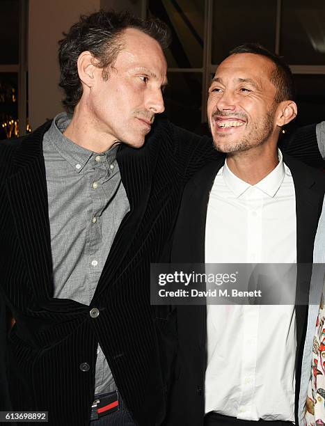 Marlon Richards and Dan Macmillan attend Dan Macmillan & Daisy Boyd's engagement party at River Cafe on October 9, 2016 in London, England.