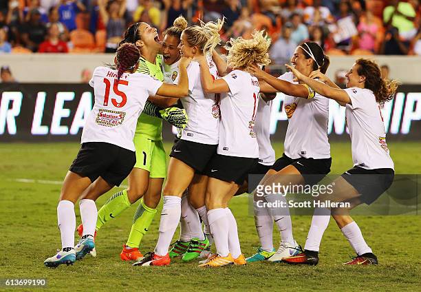 Goalkeeper Sabrina D'Angelo of the Western New York Flash celebrates with her teammates after defeating the Washington Spirit in a shootout during...