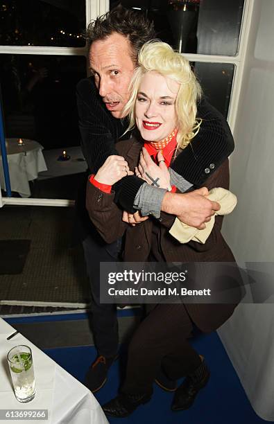 Marlon Richards and Pam Hogg attend Dan Macmillan & Daisy Boyd's engagement party at River Cafe on October 9, 2016 in London, England.