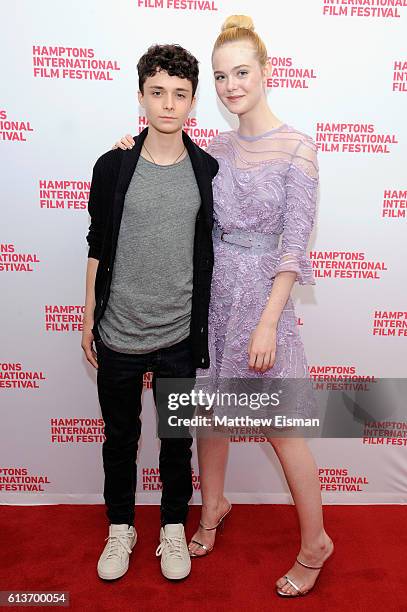 Actors Lucas Jade Zumann and Elle Fanning attend the red carpet of 20th Century Women screening during the Hamptons International Film Festival 2016...