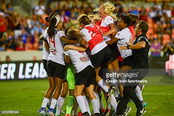 The Flash celebrate their OT win following the 2016 NWSL Championship soccer match between WNY Flash and Washington Spirit at BBVA Compass Stadium in...
