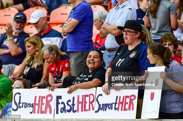 Fans show their support during the 2016 NWSL Championship soccer match between WNY Flash and Washington Spirit at BBVA Compass Stadium in Houston,...