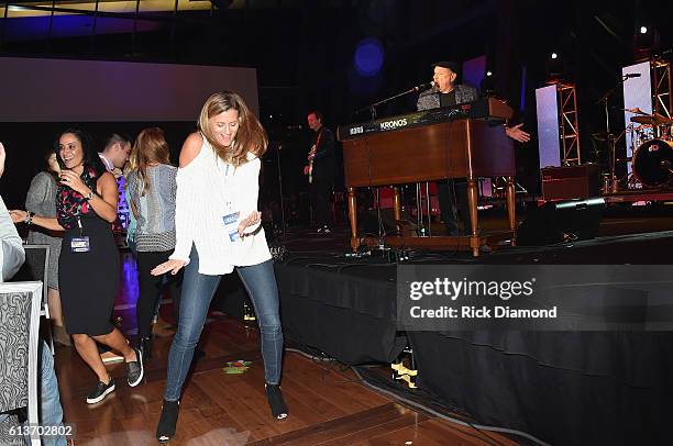 Goers dance during Felix Cavaliere's performance on day one of the IEBA 2016 Conference on October 9, 2016 in Nashville, Tennessee.