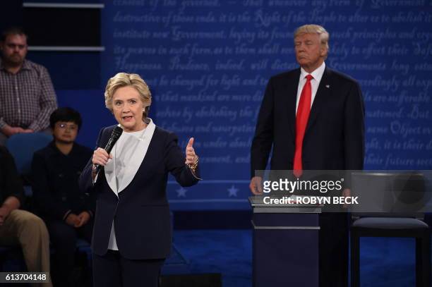 Democratic presidential candidate Hillary Clinton and US Republican presidential candidate Donald Trump debate during the second presidential debate...