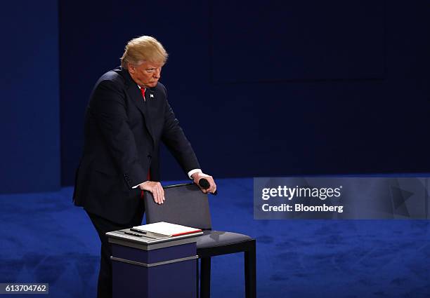 Donald Trump, 2016 Republican presidential nominee, stands during the second U.S. Presidential debate at Washington University in St. Louis,...