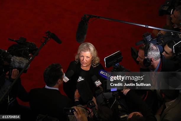 Juanita Broaddrick speaks to reporters in the spin room following the second presidential debate with democratic presidential nominee former...