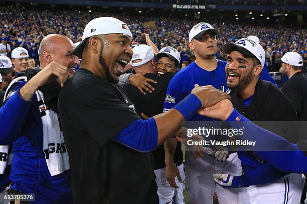 Edwin Encarnacion of the Toronto Blue Jays celebrates after the Toronto Blue Jays defeated the Texas Rangers 7-6 for game three of the American...