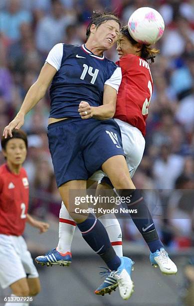 Britain - Japan's Azusa Iwashimizu attempts to head the ball during the first half of the women's soccer final at Wembley Stadium at the 2012 London...