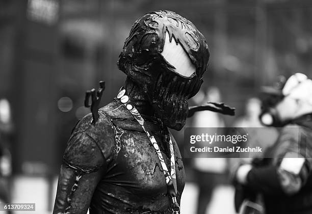 Comic Con attendee poses as Venom during the 2016 New York Comic Con - Day 4 on October 9, 2016 in New York City.