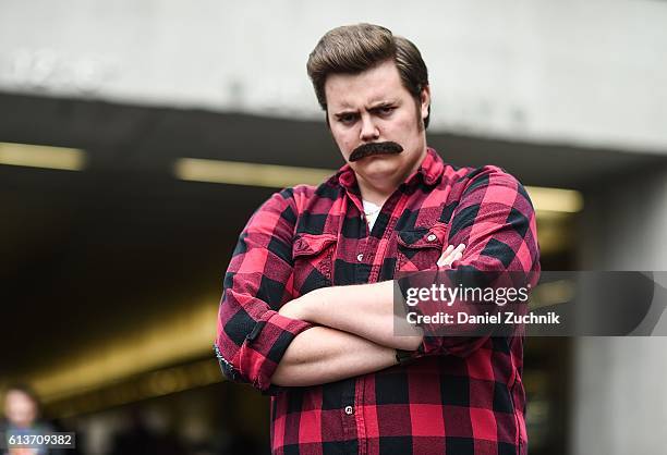 Comic Con attendee poses as Ron Swanson during the 2016 New York Comic Con - Day 4 on October 9, 2016 in New York City.