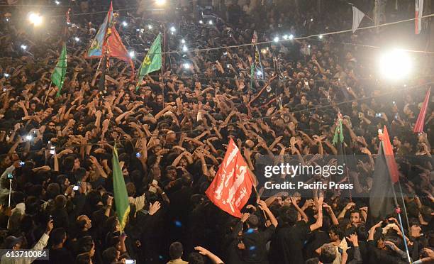 Shiite Muslims doing chest beating during the juloos of Jamaities form fakir ka Pir to Mola Ali Qadam Gah in Pakistan.