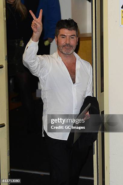 Simon Cowell seen leaving the Fountain Studios after X Factor on October 9, 2016 in London, England.