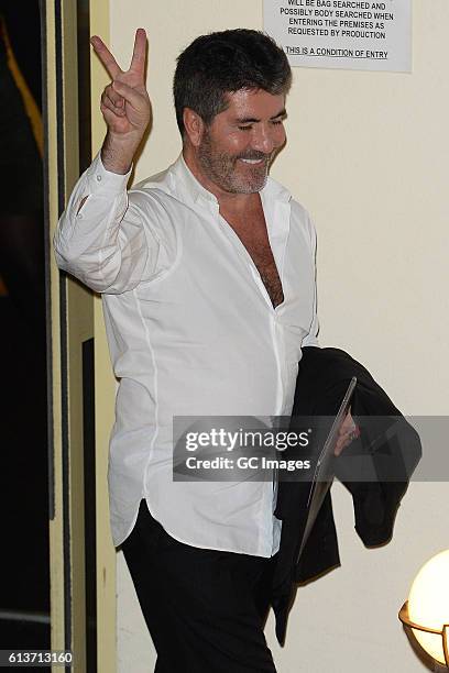 Simon Cowell seen leaving the Fountain Studios after X Factor on October 9, 2016 in London, England.