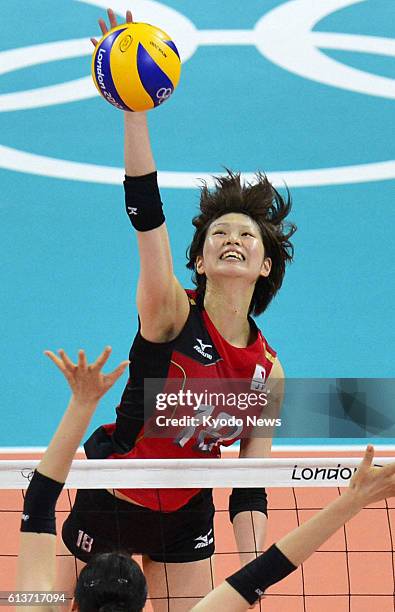 Britain - Japan's Saori Kimura spikes the ball during the second set of women's volleyball bronze medal match against South Korea at Earls Court at...