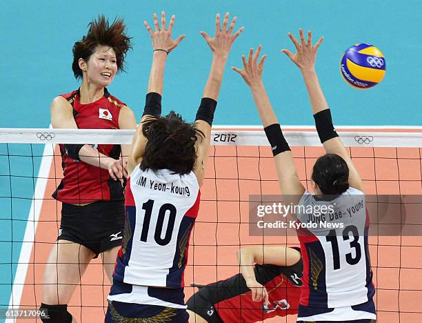 Britain - Japan's Saori Kimura plays the ball during the second set of the women's volleyball bronze medal match against South Korea at Earls Court...