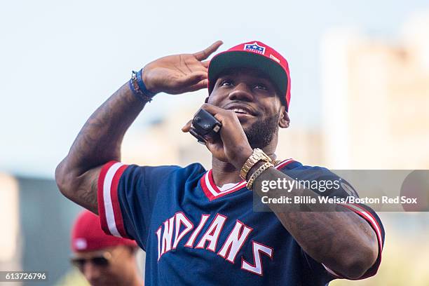 LeBron James of the Cleveland Cavaliers addresses the crowd before game two of the American League Division Series between the Boston Red Sox and the...