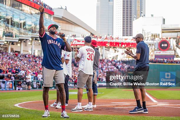 LeBron James of the Cleveland Cavaliers addresses the crowd before game two of the American League Division Series between the Boston Red Sox and the...