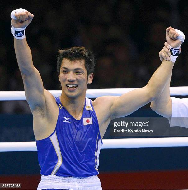 Britain - Japan's Ryota Murata celebrates after defeating Brazil's Esquiva Falcao Florentino in the men's middleweight boxing final at the 2012...