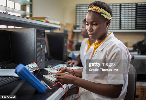 Accra, Ghana Girls Vocational Training Institute, a vocational school in which African girls are trained in electrical engineering. Here, a student...