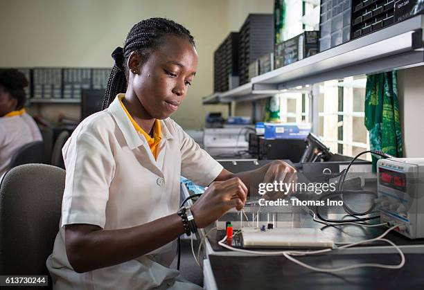 Accra, Ghana Girls Vocational Training Institute, a vocational school in which African girls are trained in electrical engineering. Here, a student...
