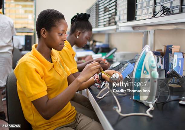 Accra, Ghana Girls Vocational Training Institute, a vocational school in which African girls are trained in electrical engineering. Here a student...