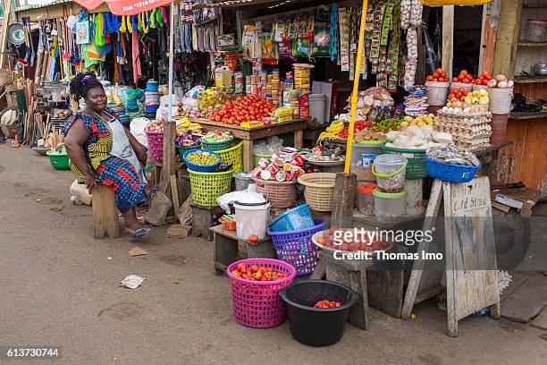 Accra, Ghana A street trader is sitting in front of her market stall where groceries are sold on September 08, 2016 in Accra, Ghana.
