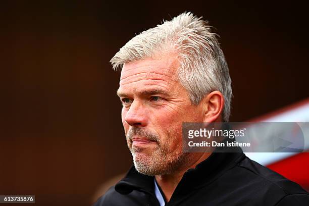 Lee Butler, Bolton Wanderers goalkeeping coach, looks on before the Sky Bet League One match between Swindon Town and Bolton Wanderers at County...
