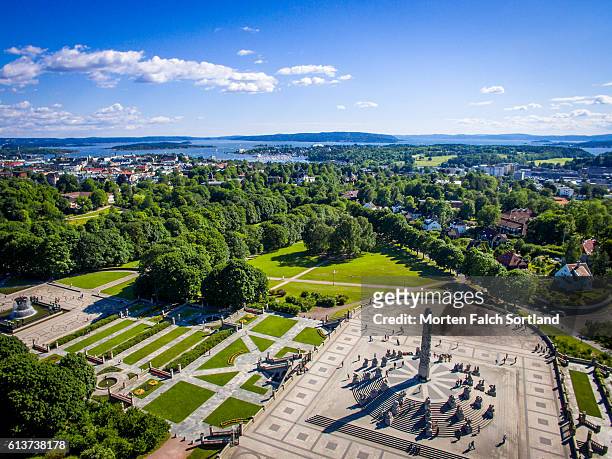 monolith and oslofjord - vigeland sculpture park stock pictures, royalty-free photos & images