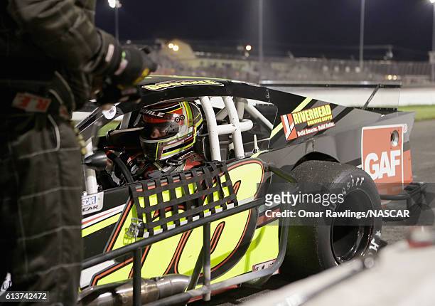 Eric Goodale, driver of the GAF Roofing Chevrolet pits during the 44th Annual NAPA Auto Parts Fall Final 150 NASCAR Whelen Modified Tour at Stafford...