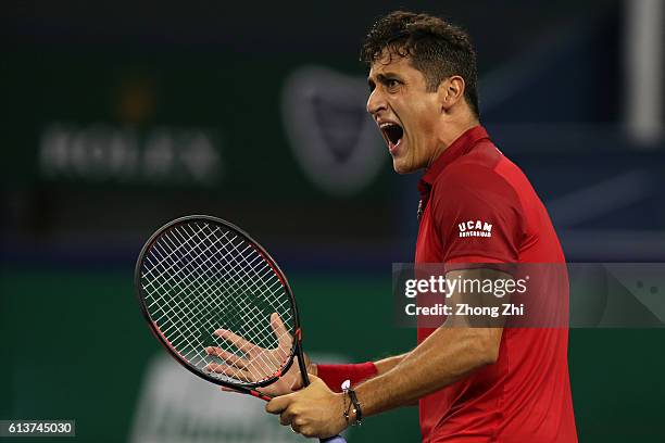 Nicolas Almagro of Spain reacts during the match against Mikhail Youzhny of Russia on Day 2 of the ATP Shanghai Rolex Masters 2016 at Qi Zhong Tennis...
