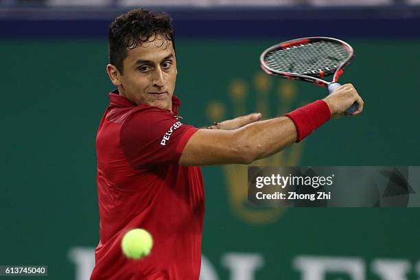 Nicolas Almagro of Spain returns a shot during the match against Mikhail Youzhny of Russia on Day 2 of the ATP Shanghai Rolex Masters 2016 at Qi...