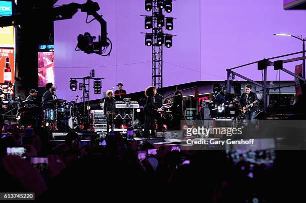 Alicia Keys and John Mayer perform in Times Square on October 9, 2016 in New York City.