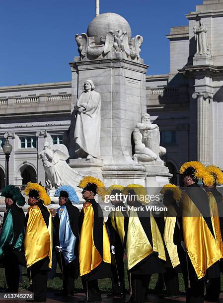 Members of the Knights of Columbus participate in a Columbus Day ceremony at the National Columbus Memorial in front of Union Station, October 10,...