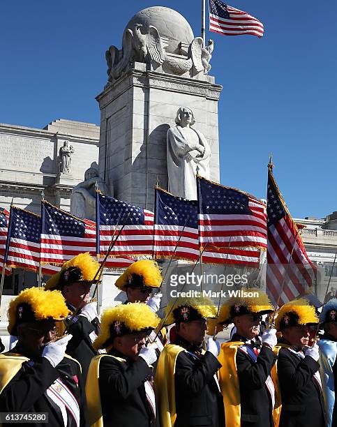 Members of the Knights of Columbus participate in a Columbus Day ceremony at the National Columbus Memorial in front of Union Station, October 10,...