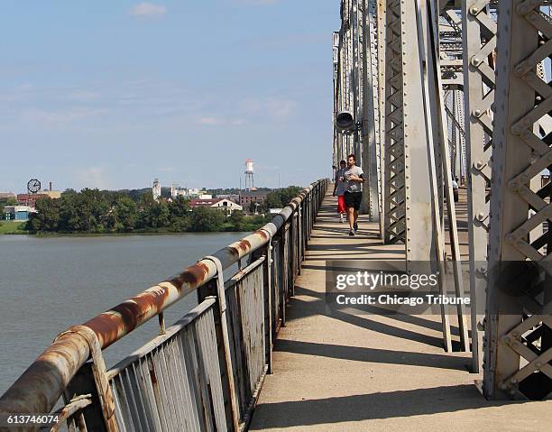 The Second Street Bridge, little changed since a teenage Cassius Clay -- as legend would have it --tossed his Olympic gold medal from there into the...