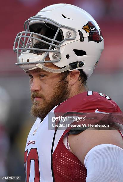 Evan Boehm of the Arizona Cardinals looks on during pregame warm ups prior to playing the San Francisco 49ers in an NFL football game at Levi's...