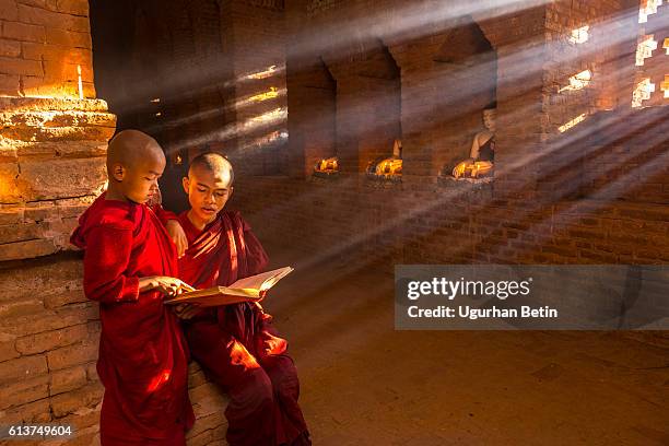young buddhist monks in myanmar - cambodian stock pictures, royalty-free photos & images