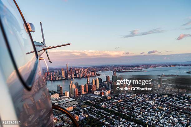 flying high and looking back! - new york aerial view stock pictures, royalty-free photos & images